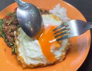 Manao Thai opens - Basil Minced Pork Rice, egg close up