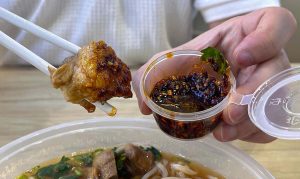zhujiao dumplings - braised beef dipped in chilli