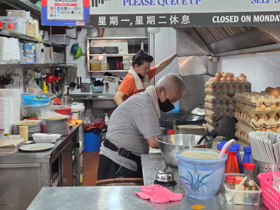best rated oyster omelette - couple working