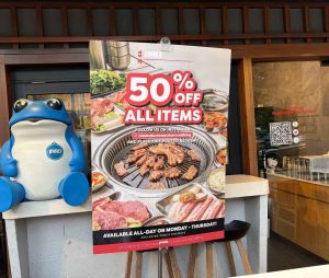 Omma Korean Charcoal BBQ deal - Sign stating 50% off all items