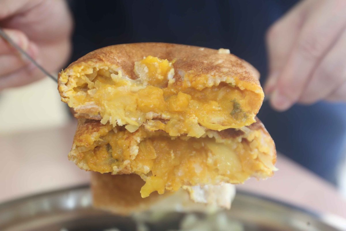 rajarani thosai newly in michelin guide - masala egg onion filling