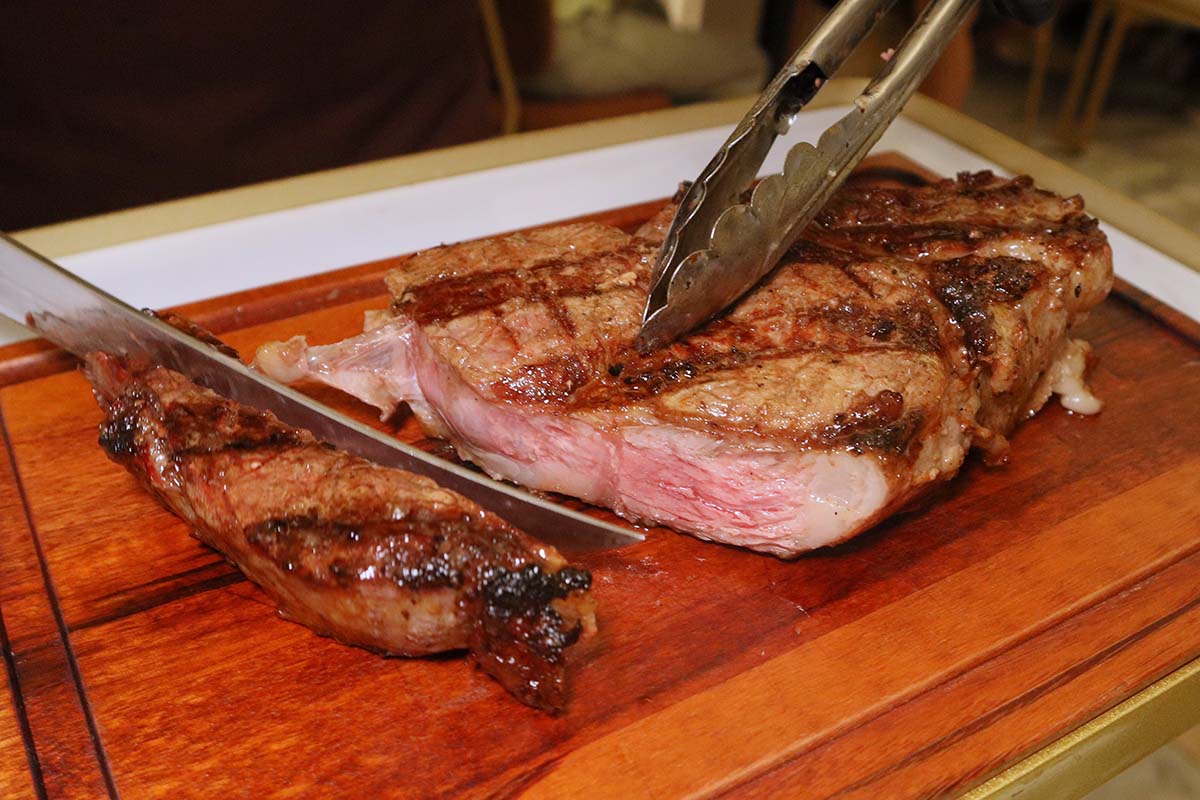 rio brazilian churrascaria - meat carving