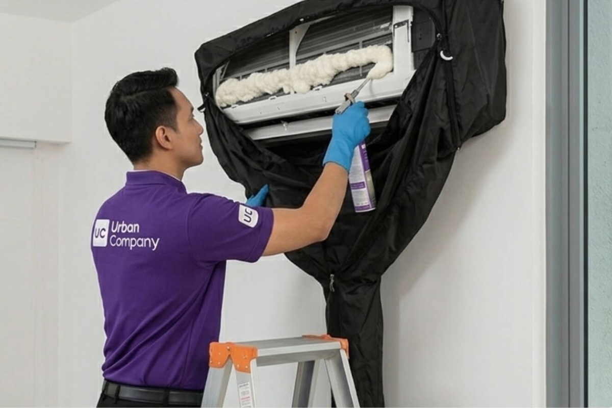 aircon - man washing aircon