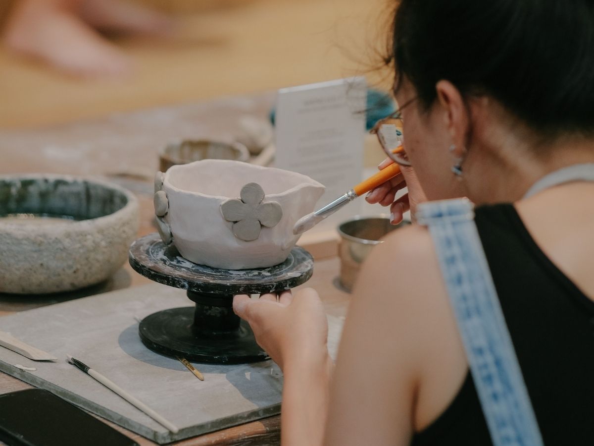 Things to do in Singapore during haze - person in pottery workshop