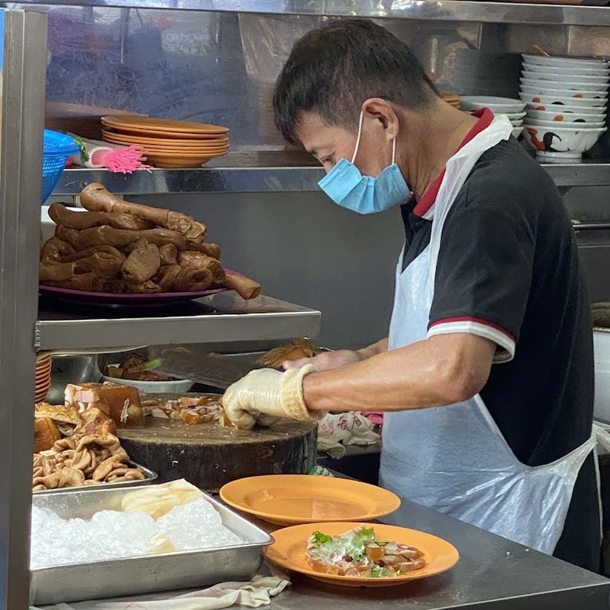 Lao Liang Pork Trotter Jelly & Shark Meat - preparing food