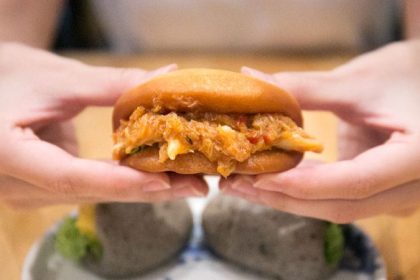 Bao Makers - holding chilli crab bao