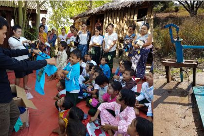 Global Village for Hope clothing drive and water pump