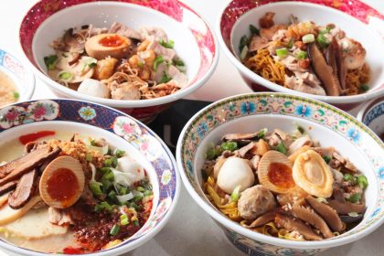 A table full of Gimee Face Noodle House dishes