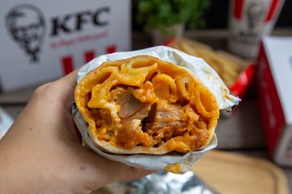 Hand holding Kfc Zingerito 9