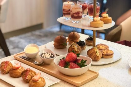A side shot of three-tiered afternoon tea set