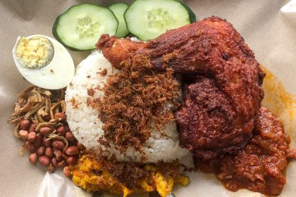 Flatlay of nasi lemak with ayam goreng berempah