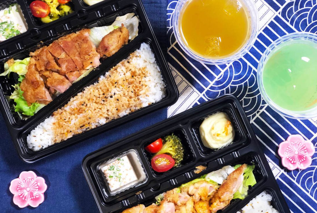 A top-down shot of umisushi bento sets