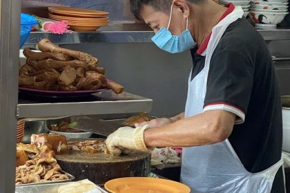 Lao Liang Pork Trotter Jelly & Shark Meat - preparing food